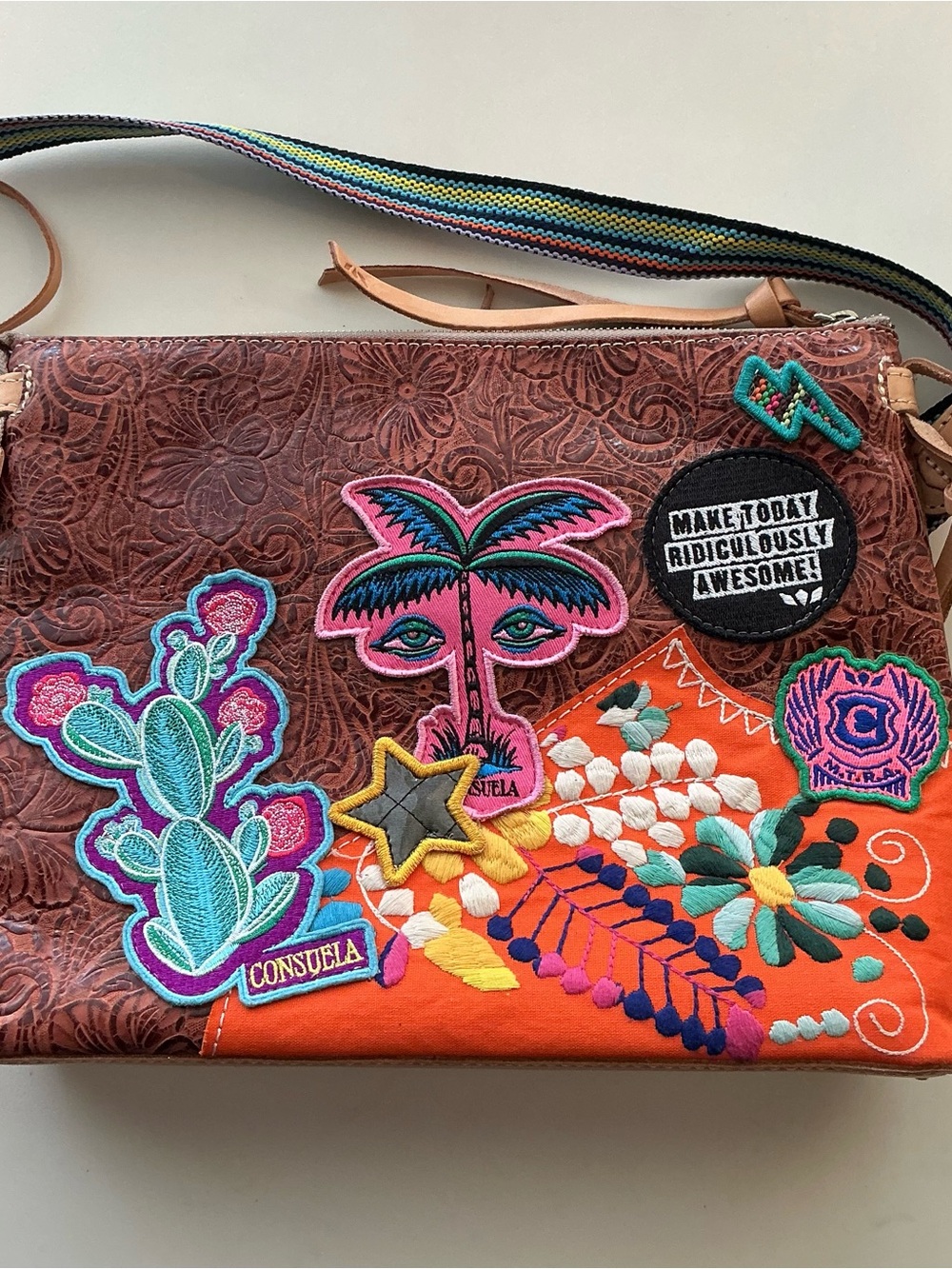 Consuela Brown Tooled Leather Crossbody with Orange Panel & Multicolor Patches